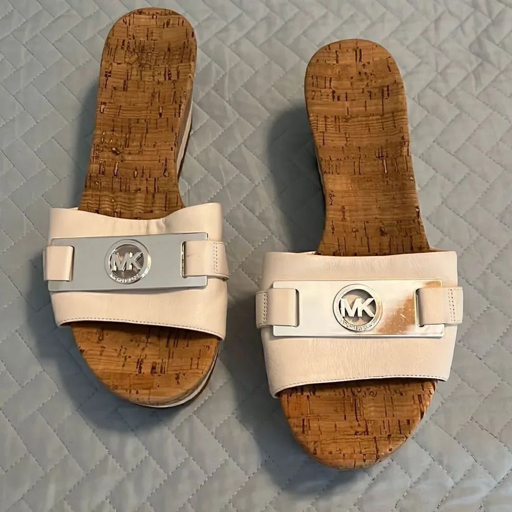 Micheal Kors White slip ons Size 10